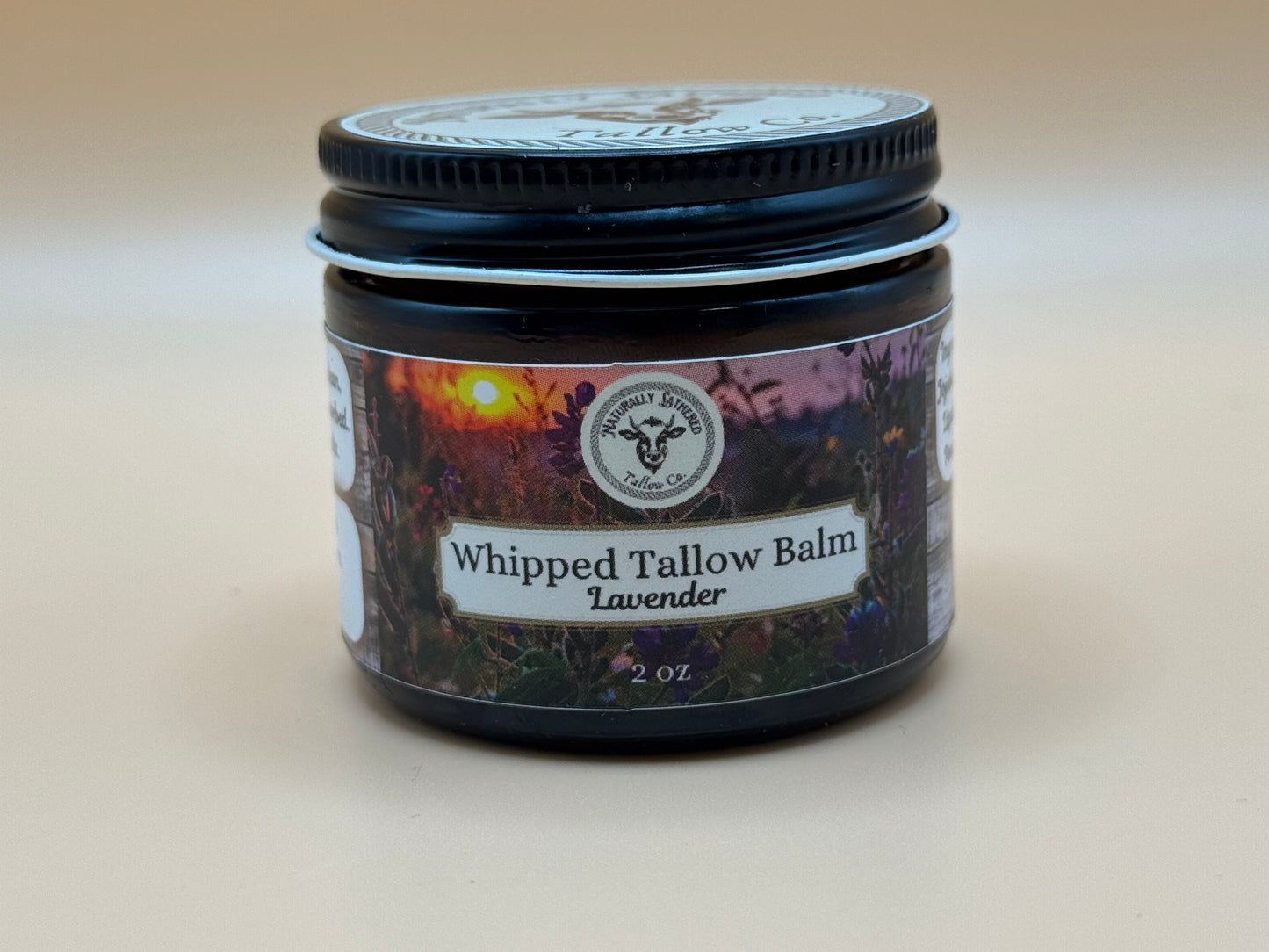Jar of Whipped Tallow Balm Lavender on a beige background