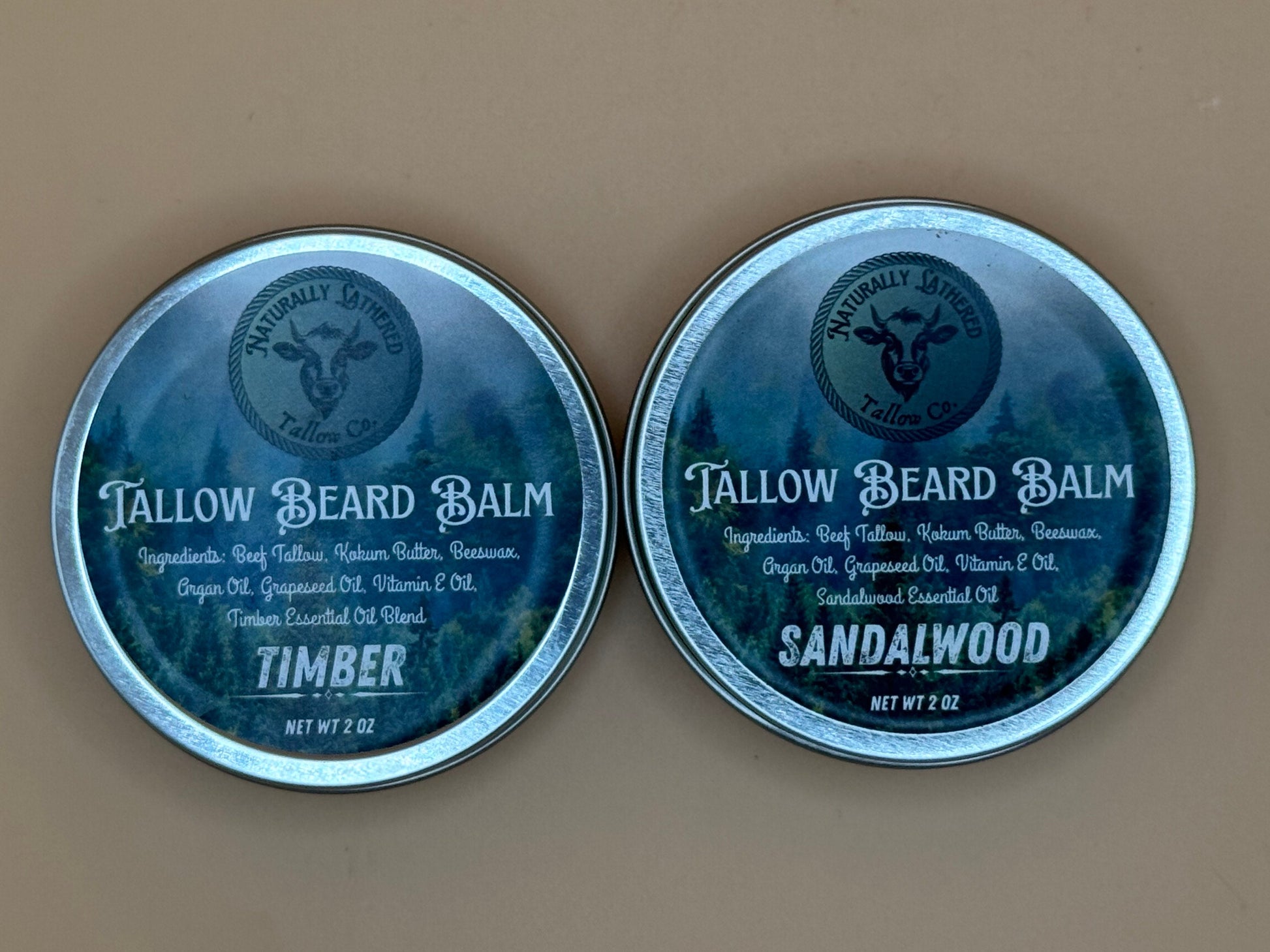 Two tins of Tallow Beard Balm on a beige background